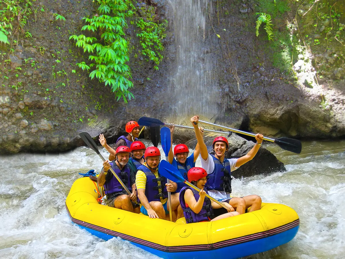 Rafting past cliffs and jungle on the Ayung river