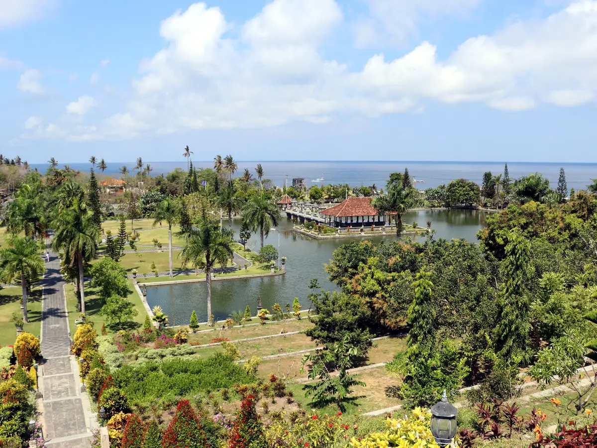 The Taman Ujung water palace framed by hills and sea
